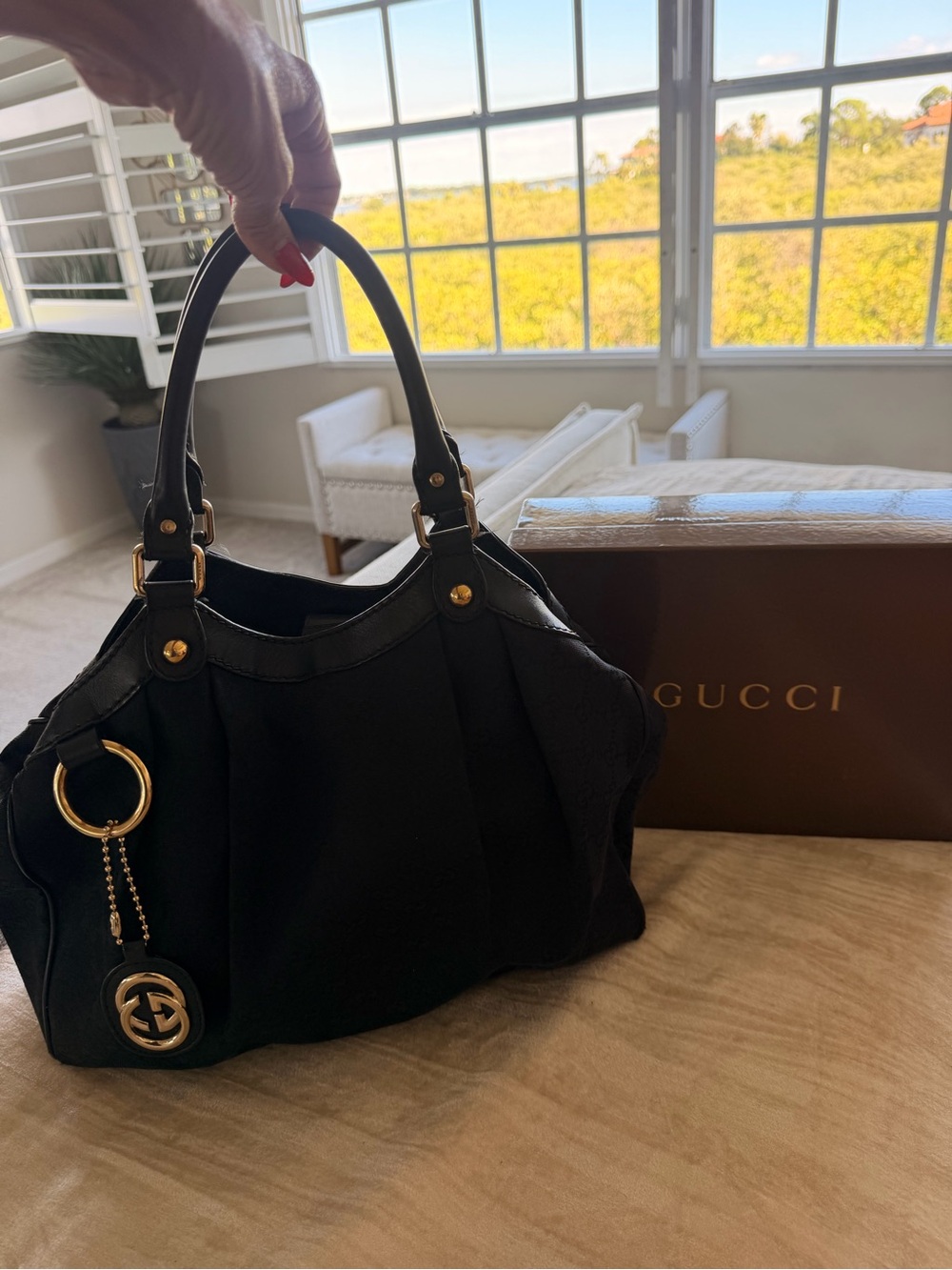Gucci Black Shoulder Bag with Gold-Tone Hardware and Charm